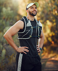 Image showing Man, hiking and proud on mountain for break, breathe or rest in workout, fitness and run. Runner, hiker and relax tired body in training, sports and health on adventure in summer in Australia nature