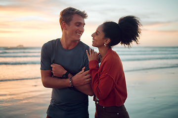 Image showing Summer, love and couple at a beach on vacation, bonding and laughing while walking along the sea at sunset. Freedom, nature and travel by happy and relax man and woman enjoying romantic ocean walk