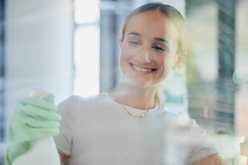 Image showing Smile, home and woman cleaning window, housework or washing shower cabin. Hygiene, glass and happy female from Canada in rubber gloves, scrub and spring cleaning, sanitize for germ free living space.