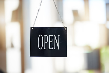 Image showing Small business, cafe and advertising with open sign for marketing, board or start of opening hours. Welcome, entrance and door of startup shop, restaurant or store in window of retail coffee shop