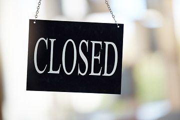 Image showing Retail, shop or store sign to show closed business in window, door or glass. Cafe, restaurant or coffee shop with poster that service has stop for client, customer and people in print notification