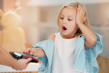 Image showing Shopping, retail and child in shock with a credit card, learning payment on card machine. Shop, fashion or rich young girl with shocked wow face with card. Mockup for fashionista, sale and clothes