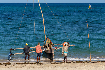 Image showing Fishermen using sailboats to fish off the coast of Anakao in Madagascar