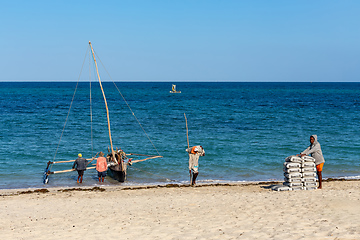 Image showing Fishermen using sailboats to fish off the coast of Anakao in Madagascar