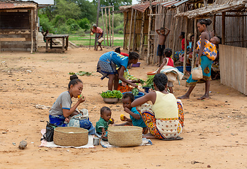 Image showing Malagasy woman's with children selling vegetables on the street. Bekopaka, Madagascar