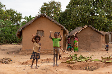 Image showing Curious group of children looking at a tourist in Ilakaka. Madagascar