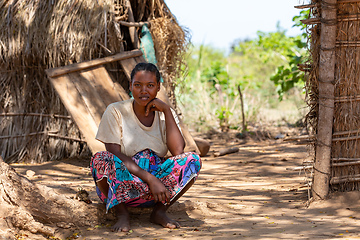 Image showing Malagasy woman in front of her hut resting in shaddow. Belo Sur Tsiribihina, Madagascar