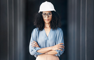 Image showing Architecture, engineering and black woman leader portrait at construction site, industrial building or property development. Pride, vision and motivation of female contractor manager in safety helmet