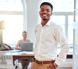 Image showing Black man, business and portrait of leader in a meeting with a smile for success and proud leadership at the office. Happy and confident African American male manager smiling for team conference