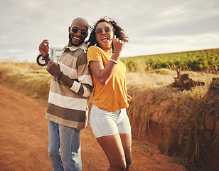 Image showing Friends, fun and dance on vacation during travel in countryside in Texas on dirt road in summer. Black man and woman dancing, freedom and smile during journey, adventure and holiday in rural area