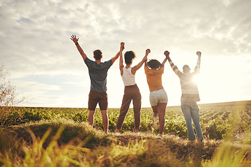 Image showing Farm, celebration and sustainability people holding hands for teamwork, earth day and growth goal achievement. Group friends celebrate ecology, farming or countryside agriculture travel in sunset