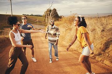 Image showing Diversity, friends and dance outdoor on holiday, relax and fun enjoy a road trip together to celebrate vacation. Multiracial group and students outside on gravel path in summer, happy and dance