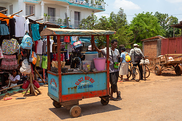 Image showing Street market in Mandoto city, with vendors and ordinary people shopping and socializing. This image portrays the local lifestyle and economy of Madagascar.