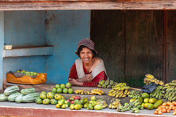 Image showing Street market in Mandoto city, with vendors and ordinary people shopping and socializing. This image portrays the local lifestyle and economy of Madagascar.