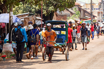 Image showing Traditional rickshaw on the Mandoto city streets. Rickshaws are a common mode of transport in Madagascar.
