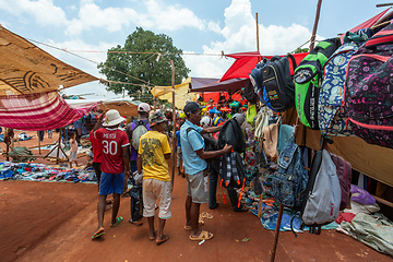 Image showing Street market in Mandoto city, with vendors and ordinary people shopping and socializing. This image portrays the local lifestyle and economy of Madagascar.