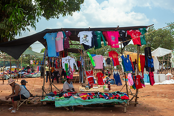 Image showing Street market in Mandoto city, with vendors and ordinary people shopping and socializing. This image portrays the local lifestyle and economy of Madagascar.