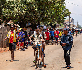 Image showing Malagasy Students in uniforms on bike, Mandoto Madagascar