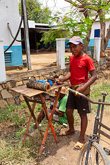 Image showing Street vendors selling Koba, a traditional Malagasy sweet