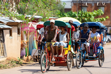 Image showing Traditional rickshaw on the city streets. Rickshaws are a common mode of transport in Madagascar.