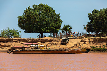 Image showing Ferry carrying passengers travels on the Tsiribihina River in Madagascar.