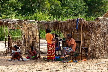 Image showing Malagasy woman in front of her hut resting in shaddow. Bekopaka, Madagascar