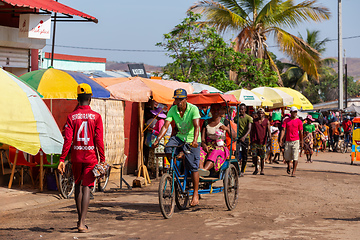 Image showing Traditional rickshaw on the city streets. Rickshaws are a common mode of transport in Madagascar.