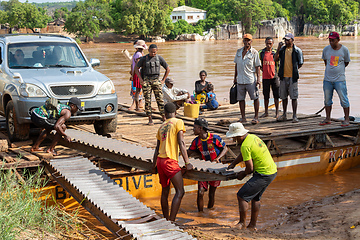 Image showing Ferry carrying passengers travels on the Tsiribihina River in Madagascar.