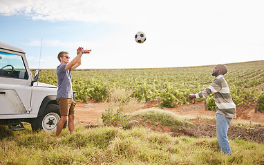Image showing Nature. soccer and men throw a football on a road trip travel break in the countryside. Exercise and fitness of people outdoor during a trip adventure playing sports on green grass in summer