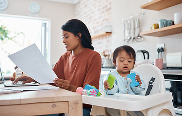 Image showing Mother, baby and laptop in kitchen, freelance and paying bills while bonding with down syndrome child. Disability, kids and multitasking parent productive freelancer in home, motherhood work balance