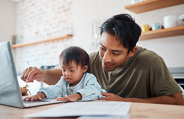 Image showing Father, down syndrome baby and laptop in the kitchen bonding with child while working at home. Asian dad playing with newborn kid with genetic disorder and helping childhood development in the house