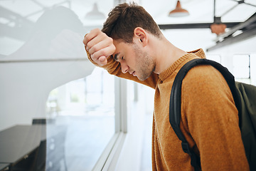 Image showing Burnout, depression or mental health with man student from anxiety or exam stress for education, college or university. Sad, headache or scared male thinking about fail, problem or project deadline