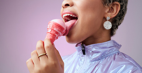 Image showing Woman, ice cream and mouth while eating pink dessert with cone against studio background. Model, zoom and lick sorbet, snack or gelato for taste in summer with professional backdrop in Los Angeles