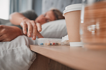 Image showing Depression pills, insomnia medicine and woman sleeping in bed for pharmaceutical, psychology or mental health awareness. Depressed, addiction and sick or sad person and drugs help or risk in bedroom