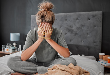 Image showing Hands, anorexia and depression with a woman on her bed holding a tape measure and looking sad or frustrated. Mental health, bulimia and eating disorder with a young female in her bedroom at home