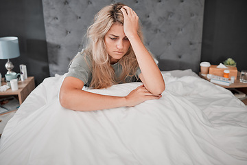 Image showing Stress, anxiety and depression, a woman in bed, thinking sad and anxious, too sick too get up. Depressed lady in bedroom with medicine, prescription drugs and pills for mental health care in USA.