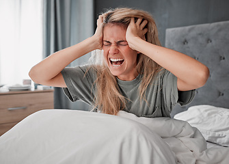 Image showing In bed in the morning with stress, angry and agro woman. Depressed girl in bedroom, hands on head and screaming in pain. Overworked, frustrated and wake up with headache from insomnia