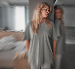 Image showing Bipolar, depression and scared young woman in a bedroom with worry, fear and stress. Insomnia, mental health problem and patient in pain with blur motion, anxiety and schizophrenia at mental hospital