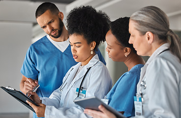 Image showing Doctor schedule, meeting and medical worker talking to hospital team about healthcare agenda. Group of medicine employees in communication about collaboration and teamwork on paper in clinic