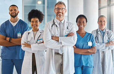 Image showing Doctor, team and hospital at work smile together for portrait in medical facility. Medic, nurse and healthcare in clinic with workers showing happiness, confidence and diversity for teamwork in Miami