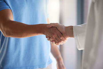 Image showing Handshake, trust and respect with a patient and medical worker or doctor shaking hands, greeting or introduction during consultation. Closeup of men with thank you gesture or welcome, agree or greet