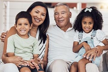 Image showing Love, grandparents or children bond on sofa in house or home living room in trust, security or safety. Family portrait, happy smile or retirement senior elderly man and woman with Mexico boy and girl