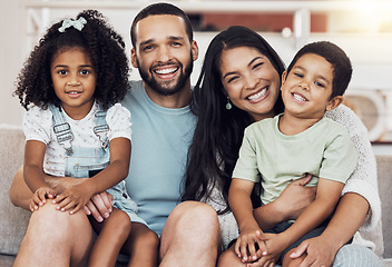 Image showing Happy, smile and portrait of a family bonding and relaxing together at home in puerto rico. Happiness, love and parents resting and holding their children with care at their comfortable house.