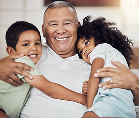 Image showing Portrait, happy family and grandfather with children in the house living room hugging, relaxing and bonding together. Elderly, happiness and old man has a big smile enjoying quality time with kids