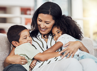 Image showing Grandmother with kids in living room, mothers day love and young girl hug grandma in Mexico. Happy elderly woman relax on sofa together, retirement happiness with children and family love small boy