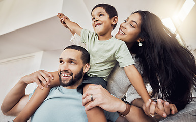 Image showing Mother, father and child are playing as a happy family having fun, bonding and enjoying quality time together at home. Smile, mom and dad smiling with playful young boy on the weekend in Mexico