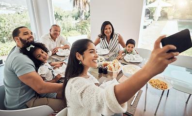 Image showing Big family, phone selfie and food in home, eating and spending time together on table. Generations, grandfather and parents with kids smiling sharing lunch picture post on social media on 5g mobile.