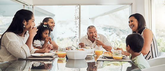 Image showing Love, food and happy family breakfast, brunch or lunch for group of people eating, bonding and enjoy quality time together. Happiness, morning and hungry big family smile while relax in dining room