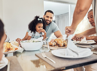 Image showing Family lunch in dining room, happy father with young girl child and woman cutting roast chicken in Atlanta. Hungry daughter eating supper at dinner table, smile together on weekend and home food