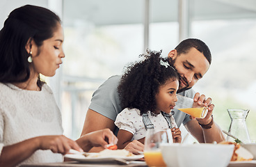 Image showing breakfast juice, vitamin c and child, family or father help kid drink for growth development and healthy lifestyle. Guatemala parents, mother or dad eating healthy food or lunch together with girl